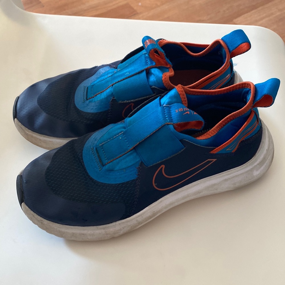 Big boys Nike slip on sneakers, size 5.5 medium width.